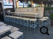 Horeca buitenterras met Steigerbuizen en gebruikt steigerhout. Stilwood. Te Antwerpen